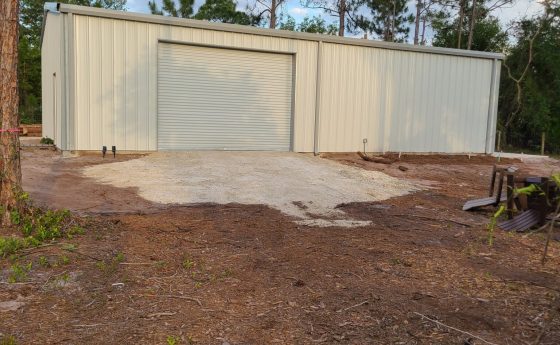 White Steel Garage in Wooded Setting