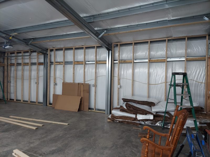 Interior of Steel Building with Various Items