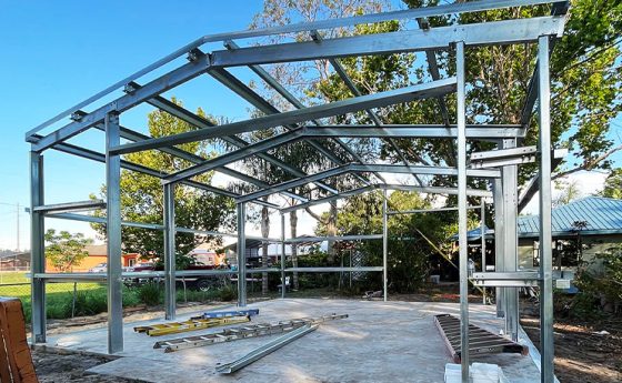 c-channel building under construction on concrete foundation