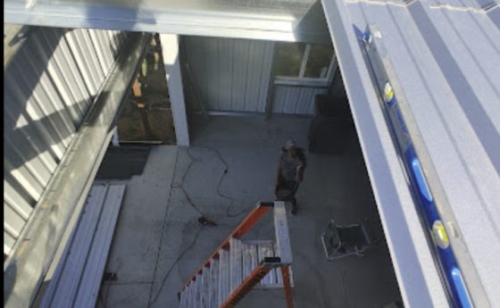 Interior of Steel Building From Perspective of Roof