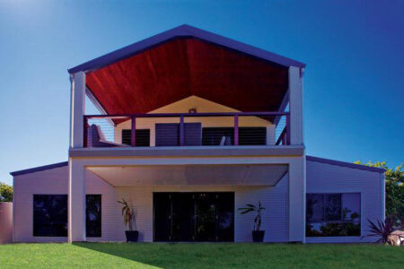 Two-Story Metal Home with Second Story Patio Space